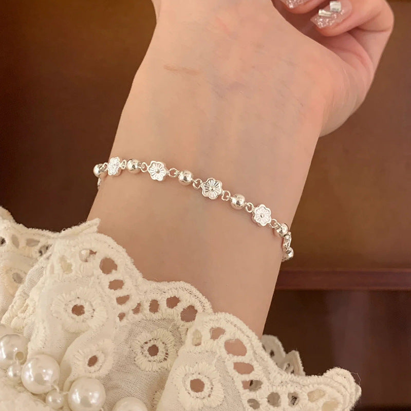Pulseira Borboleta e Flor de Pêssego Dourada | Ajustável, Moda Feminina